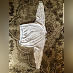 White sweater with black lines In size Large